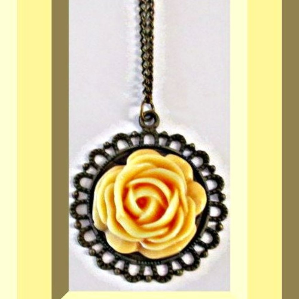 Antique Bronze In Color Yellow Flower Design Sweater Necklace